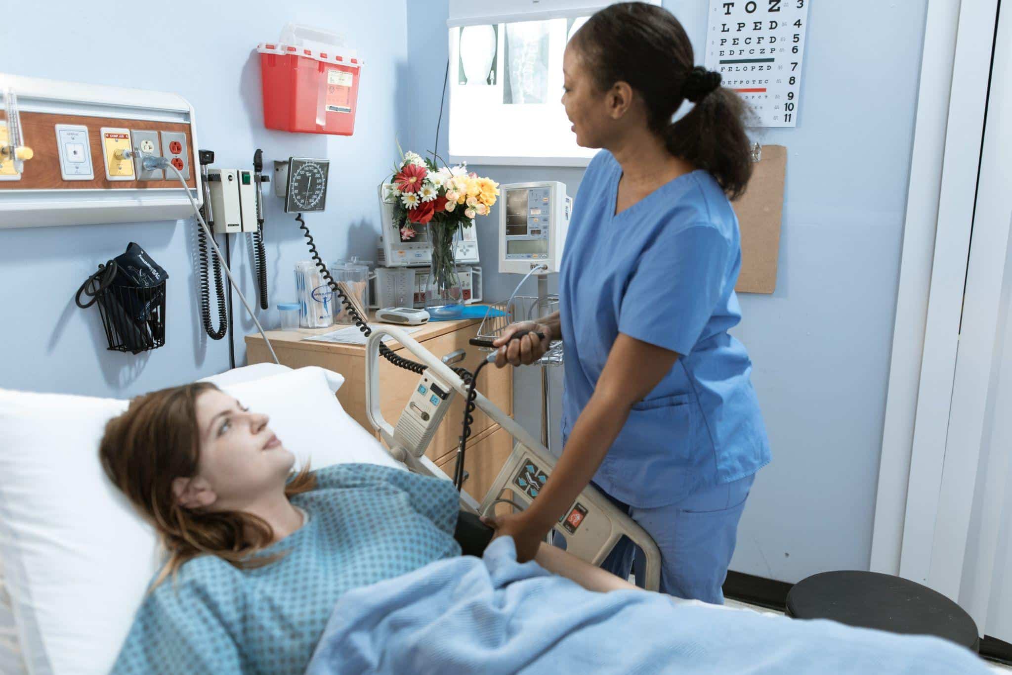 Picture of a nurse attending to her patient
